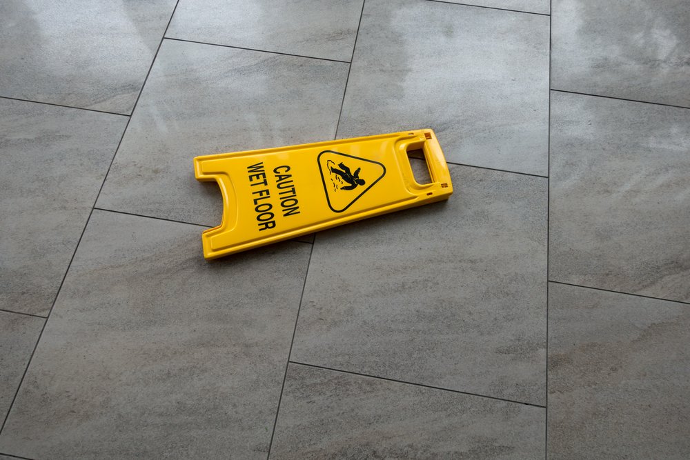 Slip and Fall Accident Sign on Wet fFoor