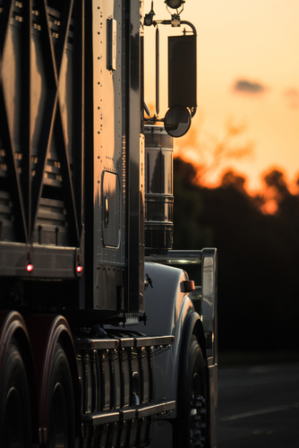 Commercial Truck at sunset, cargo truck accident lawyer