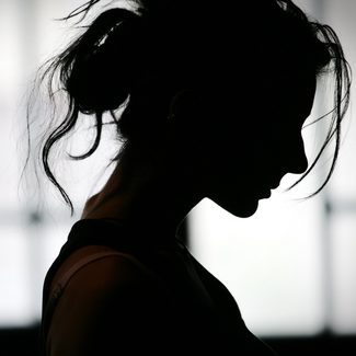 Silhouette of a woman's head in profile