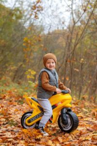 what age can a child ride on the back of a motorcycle