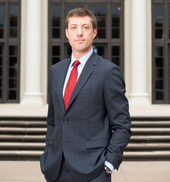 A professional attorney from Regan Zambri Long PLLC stands confidently outside a courthouse in Fairfax, Virginia, representing clients in product liability cases. Specializing in injuries caused by defective consumer goods, unsafe tools, and industrial equipment, the firm fights for those harmed by manufacturer negligence or design flaws. With extensive courtroom experience and a commitment to client justice, this Fairfax product liability lawyer offers personalized legal strategies to hold corporations accountable. Contact (202) 937-3310 to discuss your case with a trusted advocate in Virginia product defect litigation.