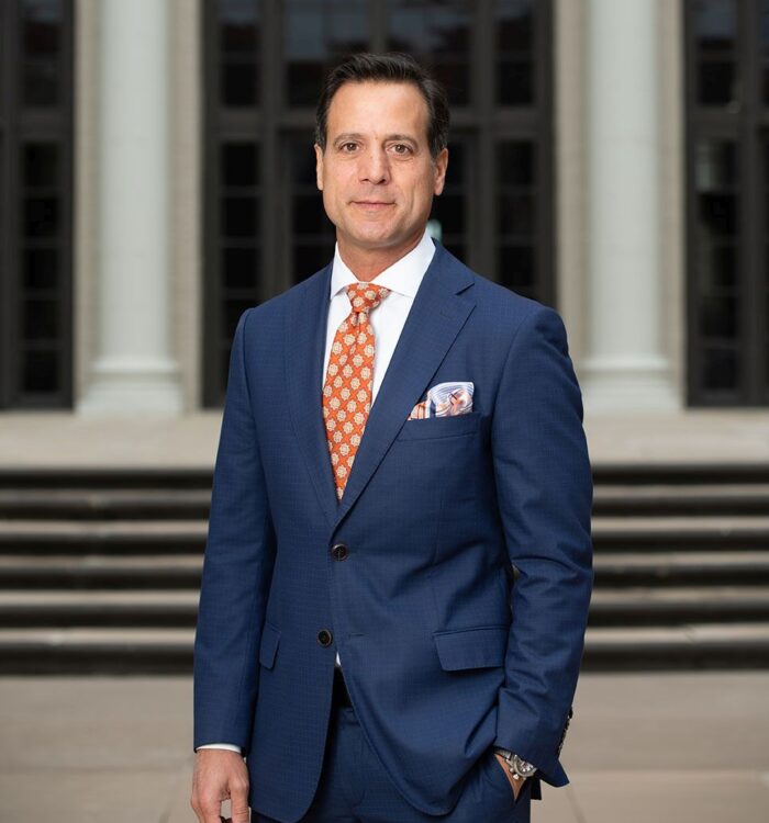 Sal Zambri, a leading food poisoning lawyer in Washington, DC, stands confidently in front of the courthouse wearing a navy blue suit and orange tie. As a founding partner at Regan Zambri Long PLLC, he represents clients in complex foodborne illness cases involving E. coli, salmonella, norovirus, and listeria outbreaks. His firm helps victims recover medical expenses, lost wages, and pain and suffering caused by negligent food handling. For trusted legal support in food poisoning claims in the DC area, call (202) 960-4596 to schedule a consultation.